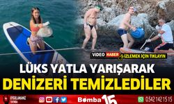 Lüks yatla denizleri yarışarak temizlediler