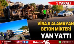 Virajı alamayan beton mikseri yan yattı