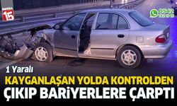 Yağmur sebebiyle kayganlaşan yolda otomobil bariyerlere çarptı