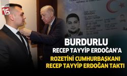 Burdurlu Recep Tayyip Erdoğan'a rozetini Cumhurbaşkanı Erdoğan taktı