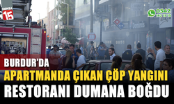 Burdur'da apartman boşluğundaki çöp yangını restoranı dumana boğdu