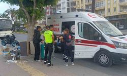 Devrilen motosikletle beraber metrelerce sürüklendiler