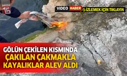 Eğirdir Gölü'nde suların çekildiği kayalıklar çakılan çakmakla alev aldı