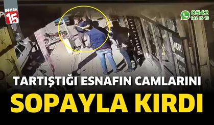 Tartıştığı esnafın camlarını sopayla kırdı