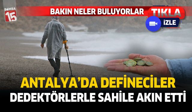 Antalya'da fırtınaya rağmen defineciler dedektörlerle sahile akın etti