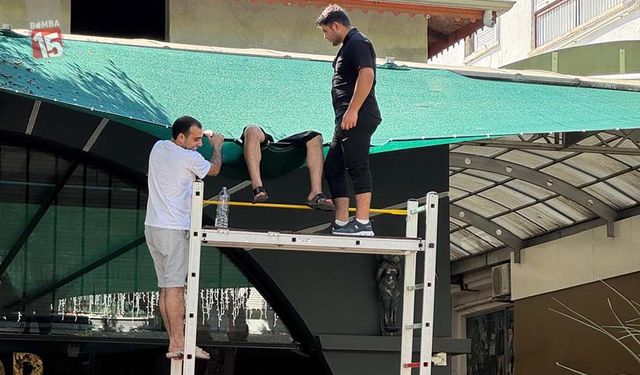 Antalya'da evinin balkonundan işyerinin tentesine düştü