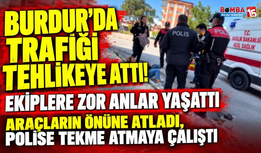 Burdur’da Cadde Üzerinde Hareketli Anlar! Araçların Önüne Atladı, Polise Direndi